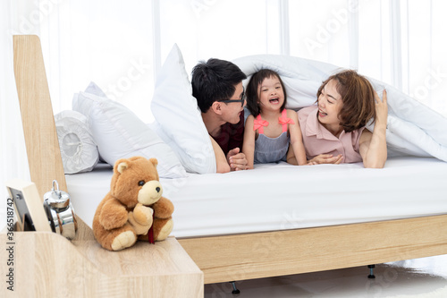 Mother, Father and disable kid in family.