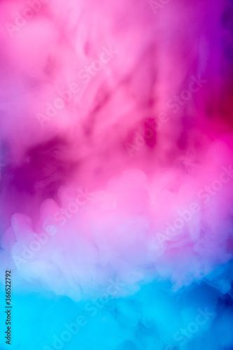 Abstract colorful, multicolored smoke spreading, bright background for advertising or design, wallpaper for gadget. Neon lighted smoke texture, blowing clouds. Modern designed. © master1305