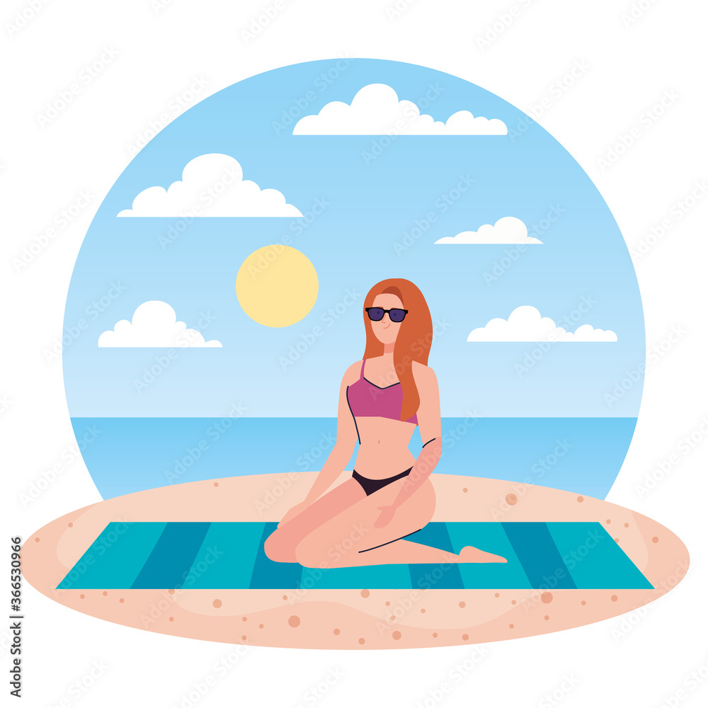 woman with swimsuit sitting on the towel, in the beach, holiday vacation season