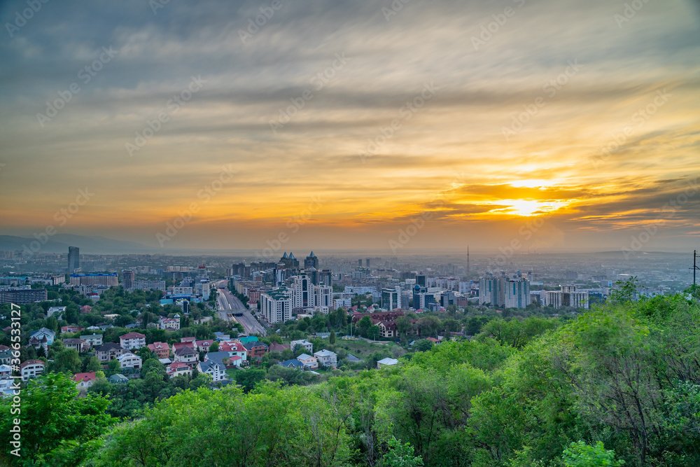 Obraz premium Almaty city at sunset from a height. Impressive view.