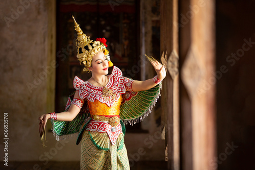 Beautiful Thai young woman portrait in Kinnaree traditional dress costume  Art culture Thailand Dancing in masked khon Kinnaree in literature amayana,  thailand culture Khon, Ayuttaya, Thailand . Stock Photo | Adobe Stock