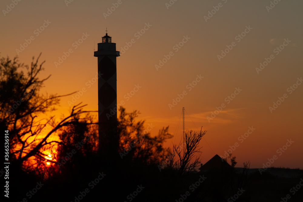 sunset behind the lighthouse