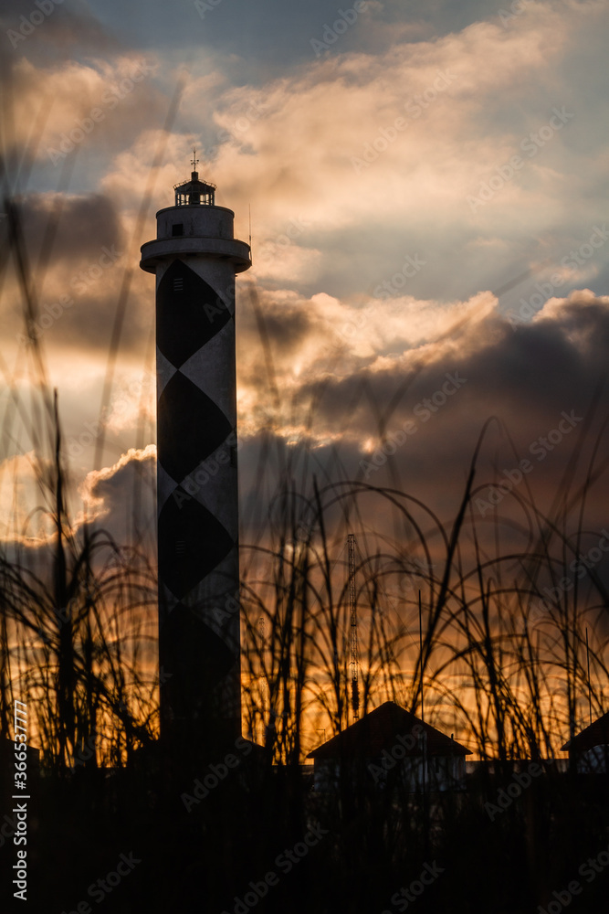 sunset behind the lighthouse