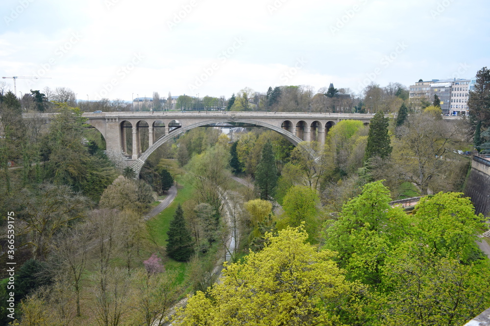 Beautiful spring view of the Adolf Bridge and nature in Luxembourg