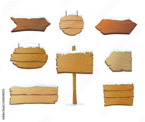 Fototapeta Naklejka Na Ścianę i Meble -  Set of isolated wooden blank signboards and pointers covered in snow. Cartoon vintage signs in different shapes. - Vector illustration