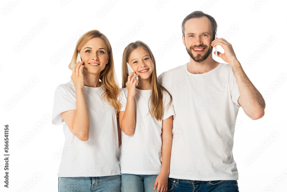 smiling family in white t-shirts talking on smartphones isolated on white smiling family in white t-shirts talking on smartphones isolated on white