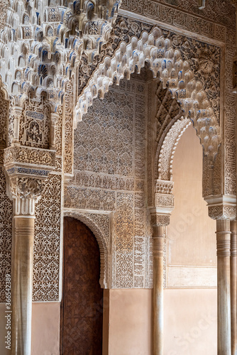 Moorish arches in the Court of the Lions in The Alhambra, Granada, Spain