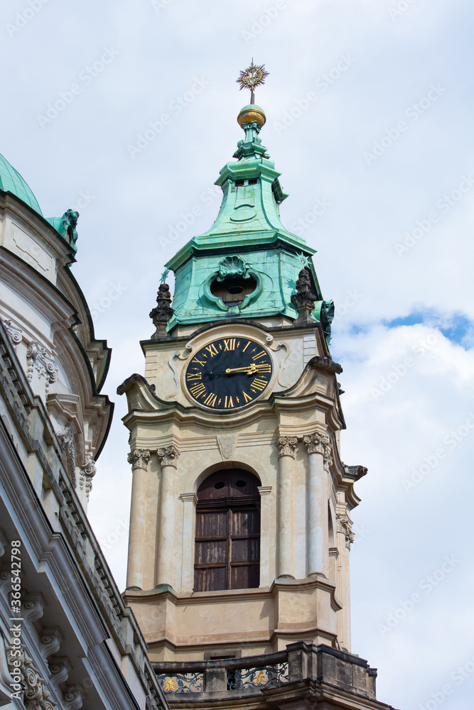 Old gothic style clock tower in Prague