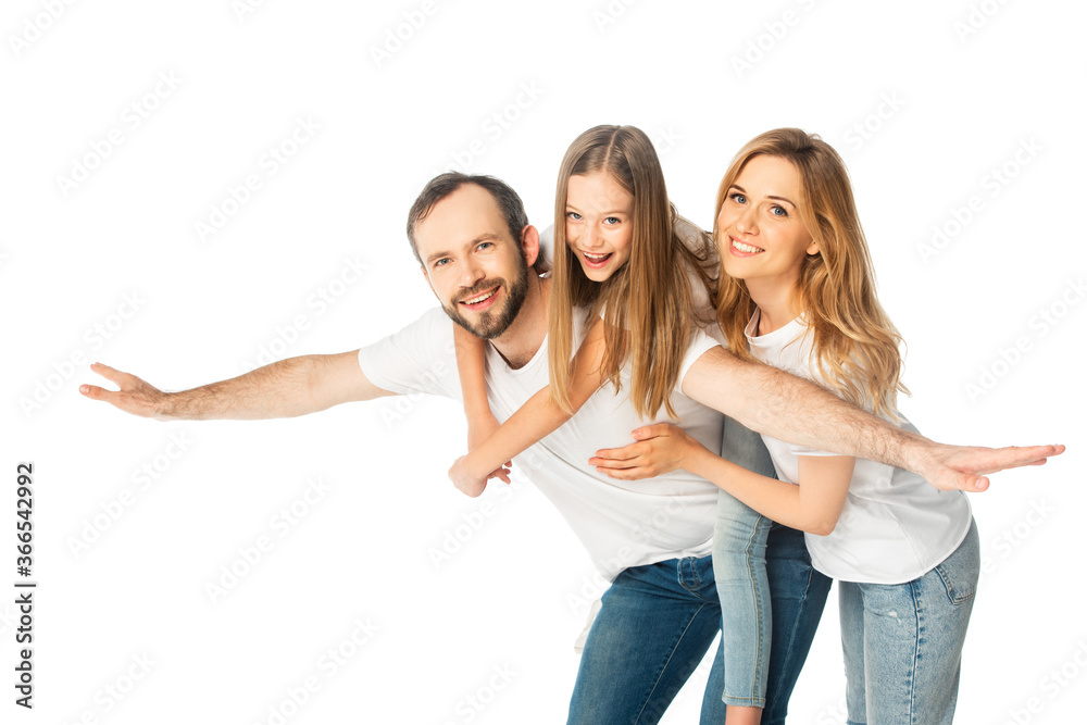 Obraz premium smiling daughter on father back near mother isolated on white