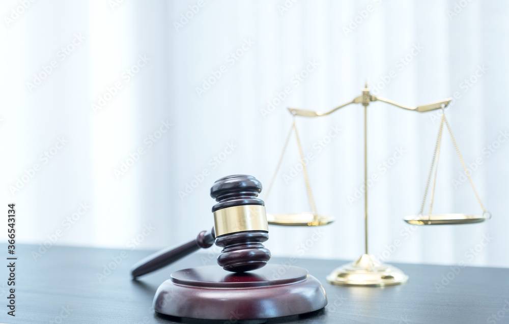 Judge gavel, scales of justice on the office desk, the white background office of a lawyer or judge Judge gavel, scales of justice on the office desk, the white background office of a lawyer or judge