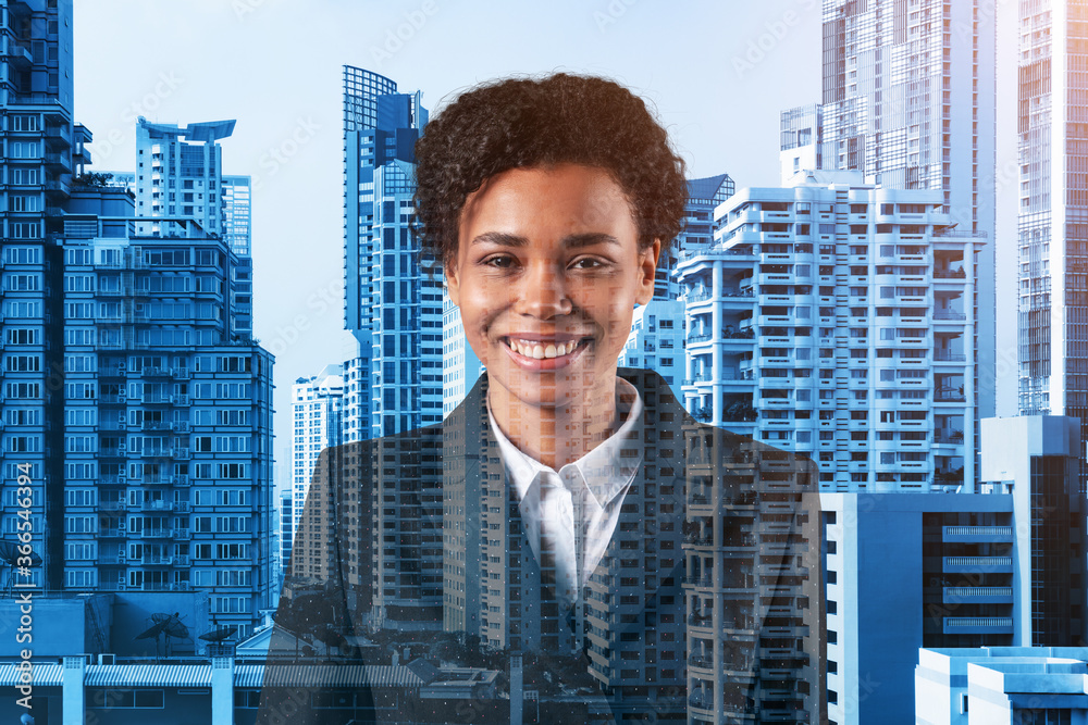 Successful smiling black African American business woman in suit. Bangkok cityscape. The concept of woman in business. Legal consultant. Double exposure. Successful smiling black African American business woman in suit. Bangkok cityscape. The concept of woman in business. Legal consultant. Double exposure.