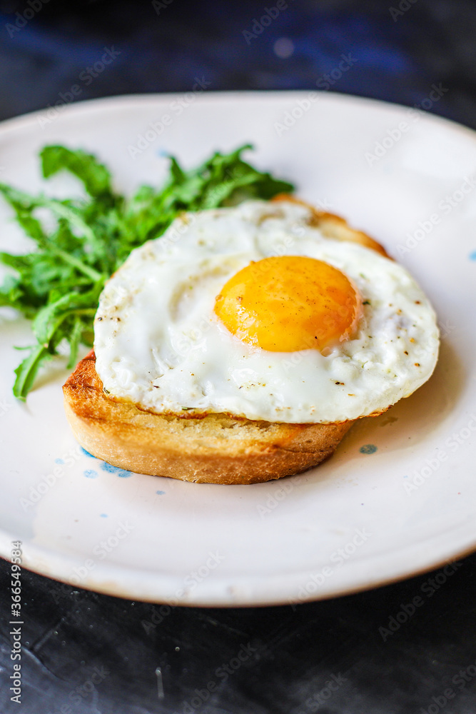 fried egg and toast bread salad delicious breakfast snack yolk and protein food background top view copy space eating healthy raw Takeaway fried egg and toast bread salad delicious breakfast snack yolk and protein food background top view copy space eating healthy raw Takeaway