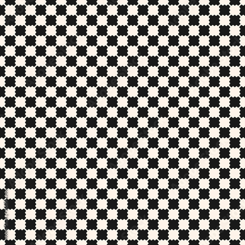 Black and white checkered texture. Vector seamless pattern with small curved shapes in staggered array, puzzle elements. Simple abstract monochrome geometric background. Repeat design for print, cover