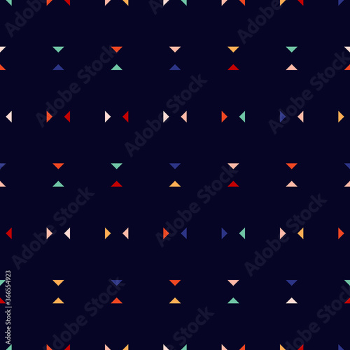 Vector minimalist seamless pattern. Subtle geometric background with small colorful triangles on black backdrop. Simple abstract minimal geo texture. Funky style. Modern design for web, print, decor