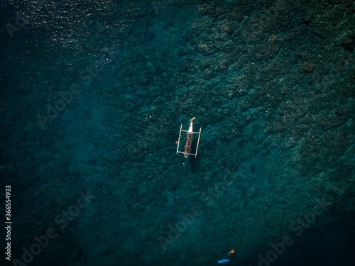 drone view of Bali ocean and Bali boat  © Jed