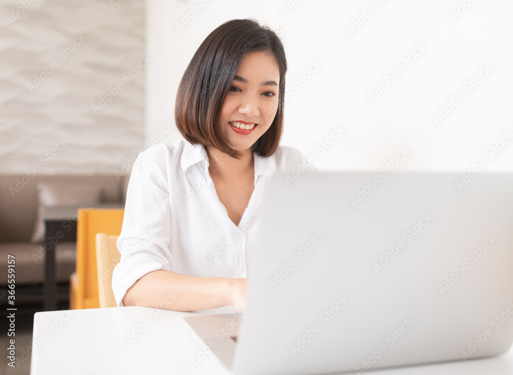 Asian business lady working in a random cafe Asian business lady working in a random cafe