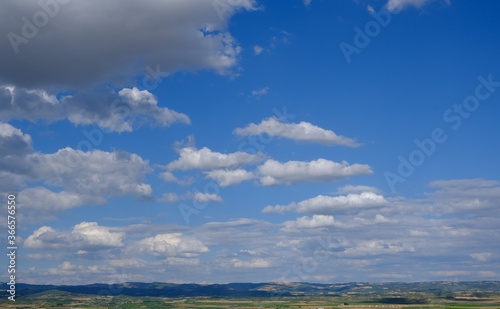 Horizon and blue sky with clouds