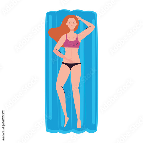 woman in lying down on inflatable float with swimsuit, summer vacation season