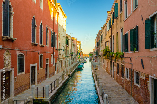 Small canal at Sunset with colourfoul houses - Venice, Venezia, Italy