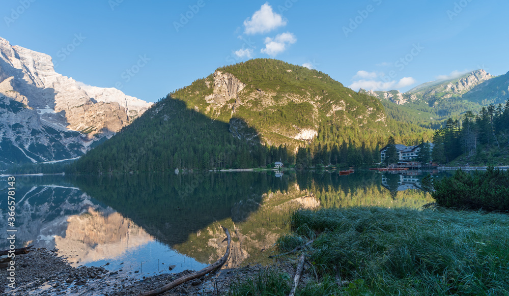 Mountain landscape with reflections on the Braies lake in Val Pusteria
