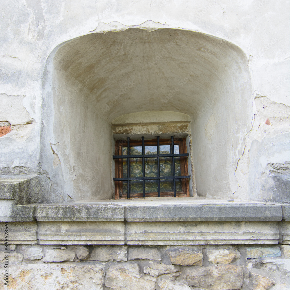 window in a stone wall