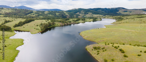 Fototapeta Naklejka Na Ścianę i Meble -  Aerial view of water and mountains