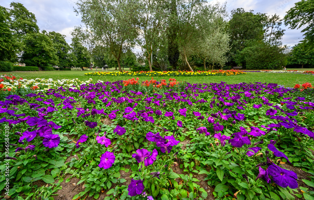 The Croydon Road Recreation Ground in Beckenham (Greater London), Kent, UK. The recreation ground is a park in central Beckenham that features flowers, trees, a children's play area and tennis courts.
