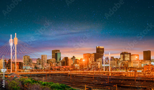 Nelson Mandela Bridge at night with Johannesburg city skyline in Gauteng South Africa