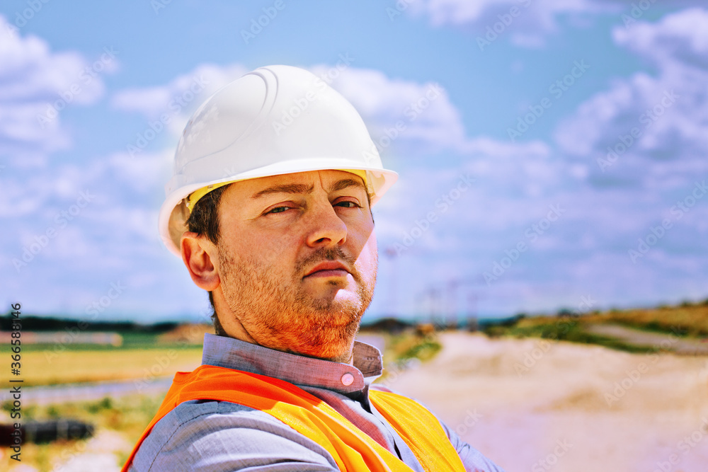 Civil engeering in helmet at the construction Civil engeering in helmet at the construction