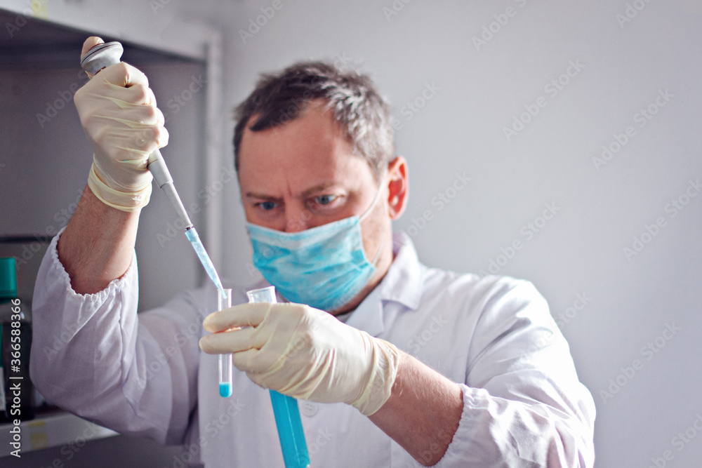 Scientist with pipette Scientist with pipette