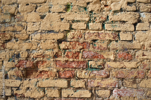 very old yellow brick wall background