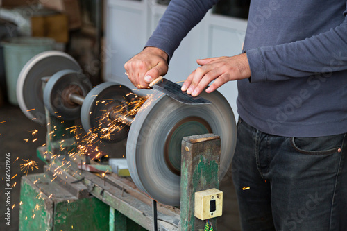 Sharpening the knife photo