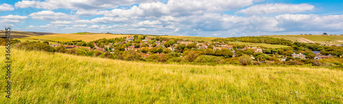 Fotografi A panorama view from Beacon Hill across the town of Rottingdean, Sussex, UK in s