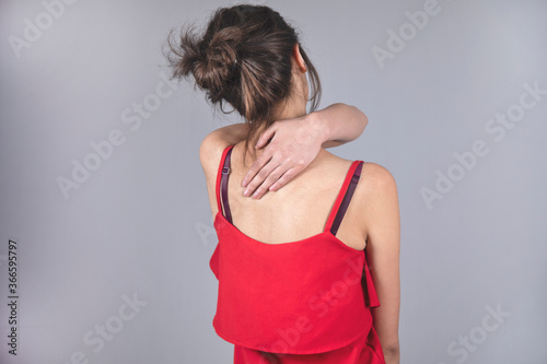 woman hand in ache back
