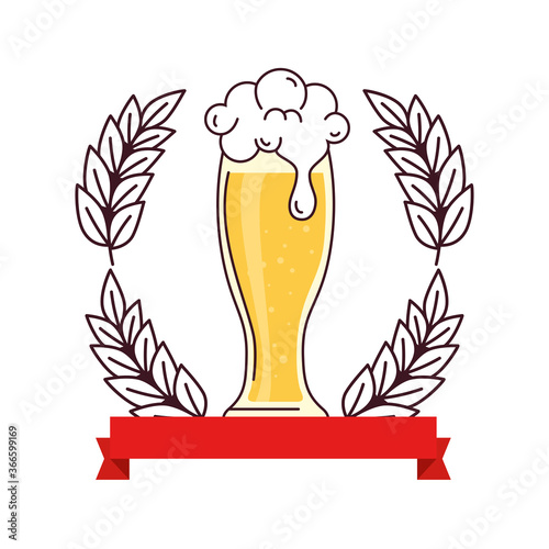 glass of beer with ribbon decoration and spike on white background