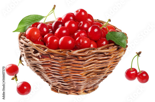 cherries in basket isolated on white background