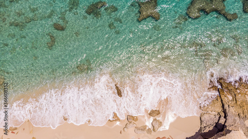 Scenic aerial view of white sandy beach. White sandy beach in cupecoy St.Maarten