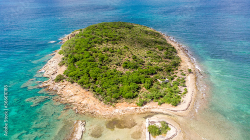 Aerial view of an empty small island in the caribbean.