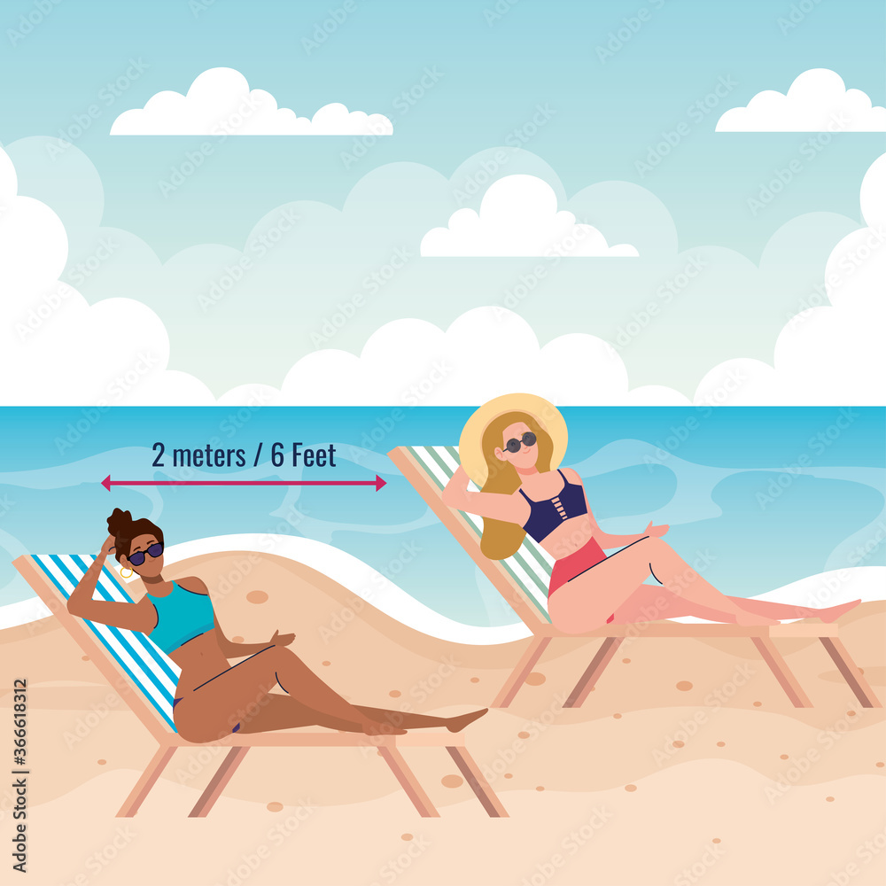 social distancing on the beach, women keep distance on the chair beach, new normal summer beach concept after coronavirus or covid 19 social distancing on the beach, women keep distance on the chair beach, new normal summer beach concept after coronavirus or covid 19