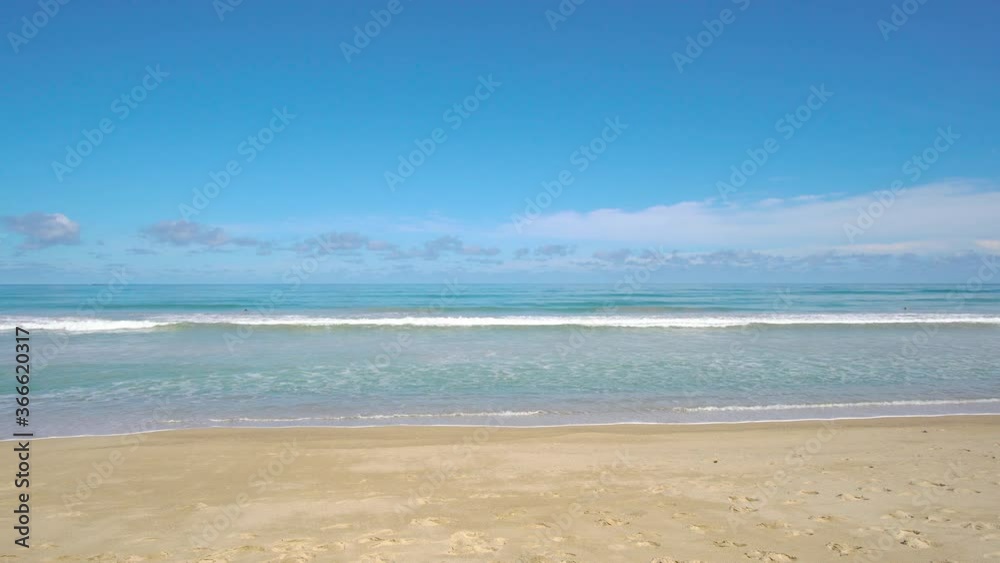 Phuket beach sea. Landscape view of beach sea and sand in summer sun. Beach space area background. At Naiharn beach, Phuket, Thailand. On September 2020. 4K UHD Videoclip 3840x2160P. 29.97.FPS Phuket beach sea. Landscape view of beach sea and sand in summer sun. Beach space area background. At Naiharn beach, Phuket, Thailand. On September 2020. 4K UHD Videoclip 3840x2160P. 29.97.FPS