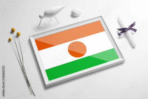 Wallpaper Mural Niger flag in wooden frame on table. White natural soft concept, national celebration theme. Torontodigital.ca