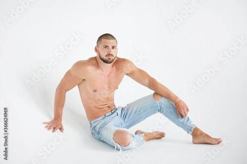 young man sitting on the floor