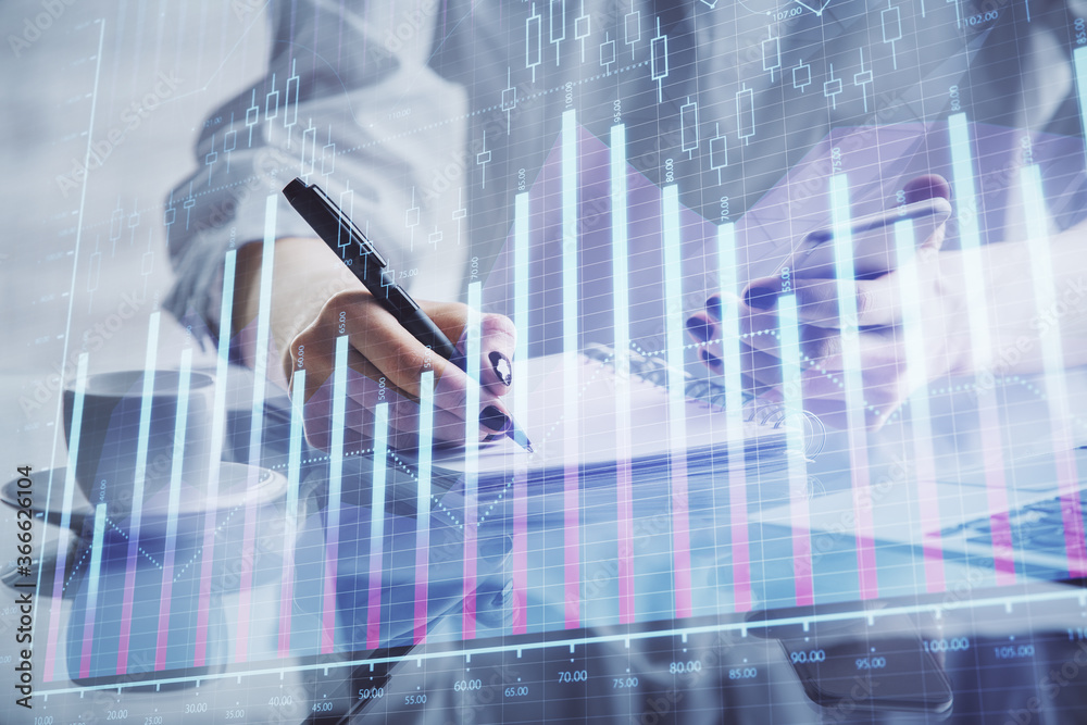 Double exposure of financial graph sketch hologram and woman holding and using a mobile device. Stock exchange concept. Double exposure of financial graph sketch hologram and woman holding and using a mobile device. Stock exchange concept.