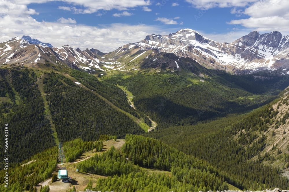 Lake Louise Chairlift and Ski Area with Scenic Alberta Summertime Mountain Landscape in Banff National Park, Canadian Rockies
