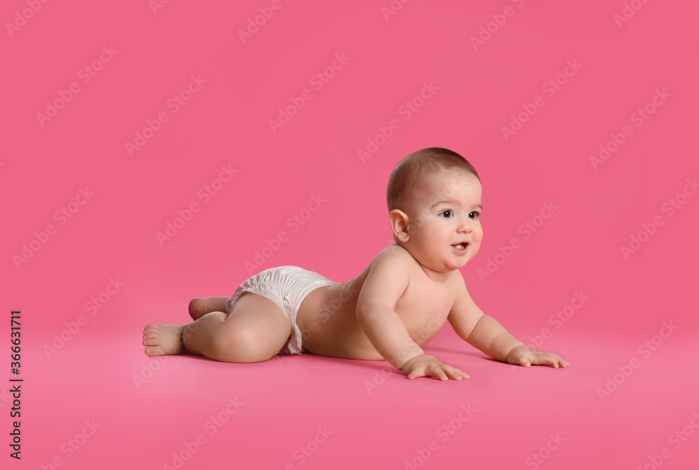 Cute little baby in diaper on pink background. Space for text