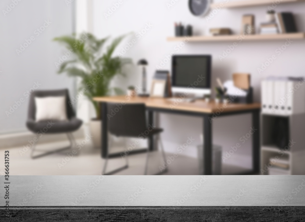 Empty stone surface and blurred view of modern office interior, closeup. Space for text Empty stone surface and blurred view of modern office interior, closeup. Space for text