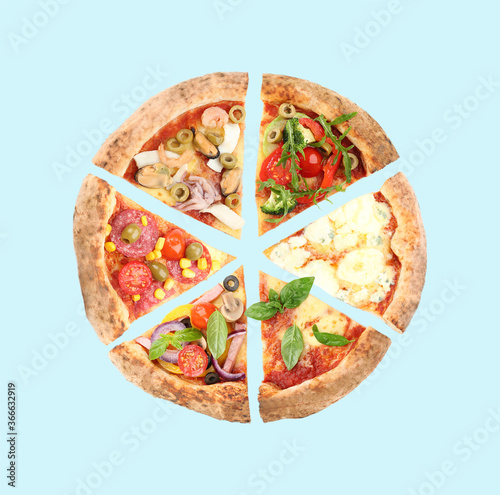 Slices of different pizzas on light blue background, top view