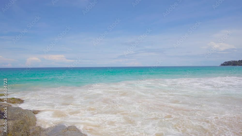 Phuket, Thailand. Beautiful beach sea sand and sky. Landscape view of beach sea sand and sky in summer day. Beach space area. At Patong Beach, Phuket, Thailand. On 20 July 2020. 4K UHD. Video Clip Phuket, Thailand. Beautiful beach sea sand and sky. Landscape view of beach sea sand and sky in summer day. Beach space area. At Patong Beach, Phuket, Thailand. On 20 July 2020. 4K UHD. Video Clip