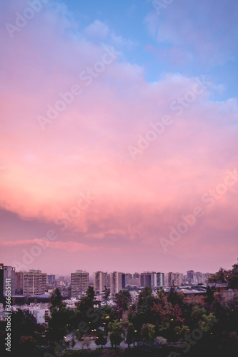 Beautiful and colorful cloudy sky over Santiago downtown with and Los Andes mountains, Chile
