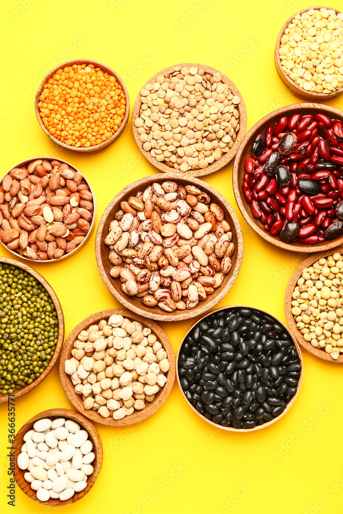 Different raw legumes on color background Different raw legumes on color background